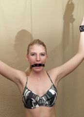 Dani in Bondage - leather cuffs and ring gag (2851).jpg