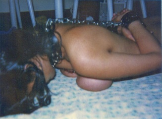 BDSM Slave face down on bound breast2.jpg